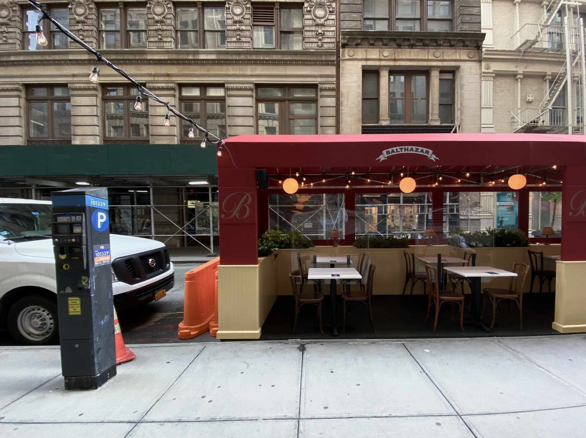 Red sidewalk cafe in the city